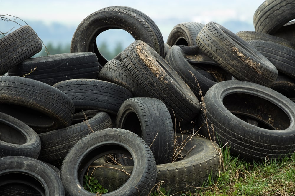Pile of old tires in need of tire removal services