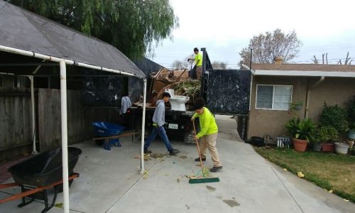 junk removal pros during a junk removal job