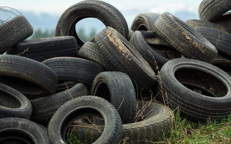 Pile of old tires in need of tire removal services